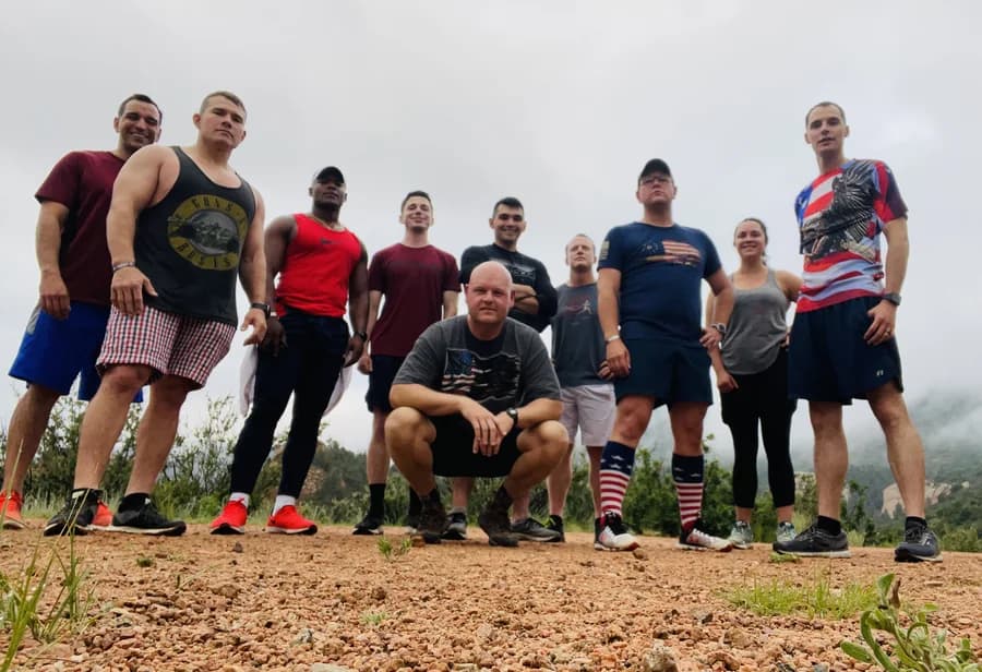 Group of service members and veterans gathered together — the community Roll Call is built for